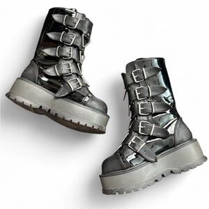 Demonia Slacker 160 buckle patent leather platform boots